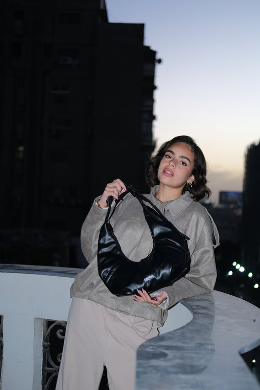 The mini croissant bag in midnight (Leather )