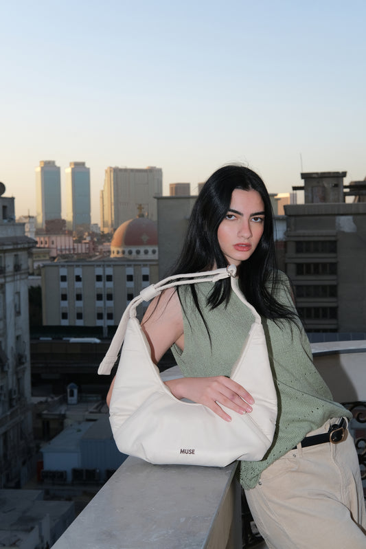 The mini croissant bag in latte