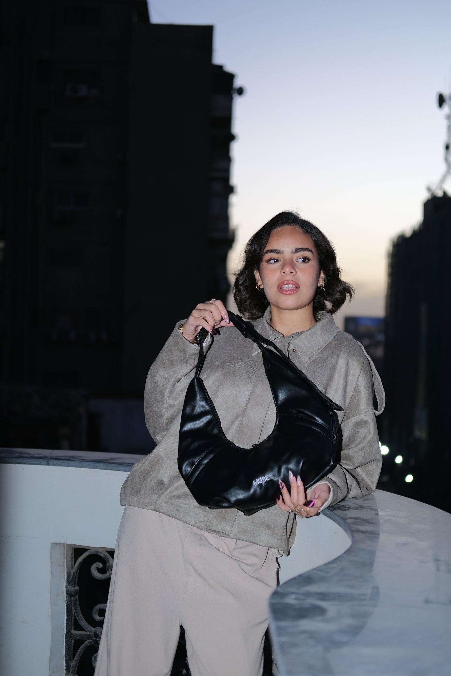 The mini croissant bag in midnight (Leather )