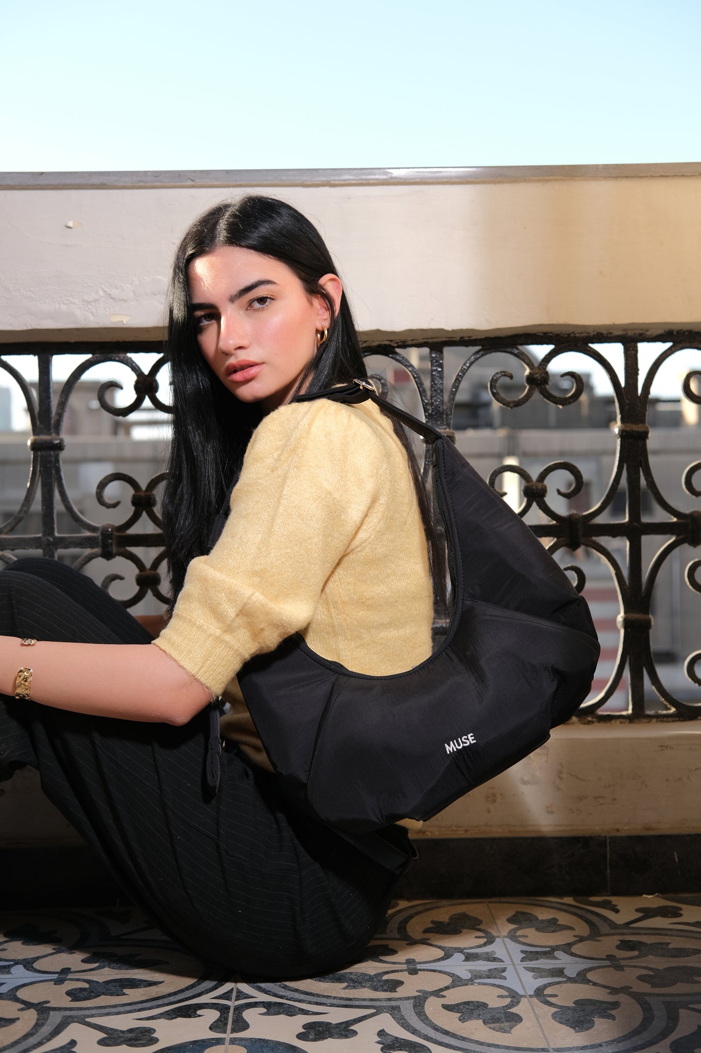 The mini croissant bag in Black