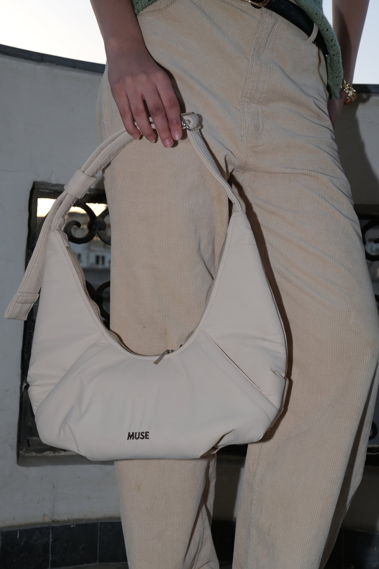 The mini croissant bag in latte