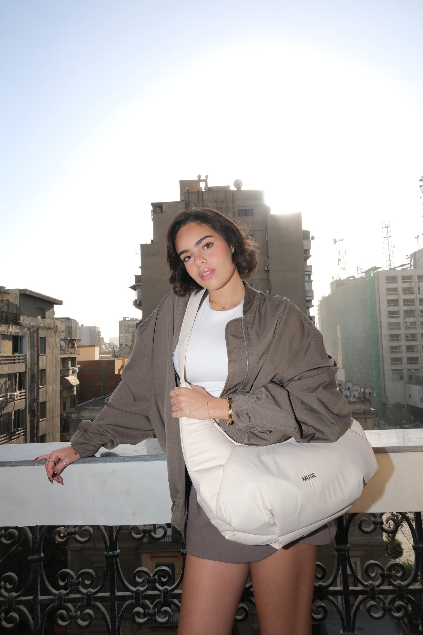 The croissant Bag in latte