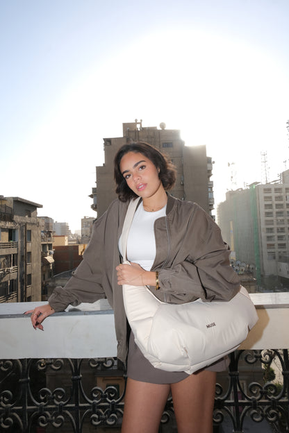 The croissant Bag in latte