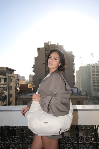 The croissant Bag in latte