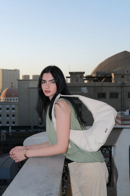 The mini croissant bag in latte