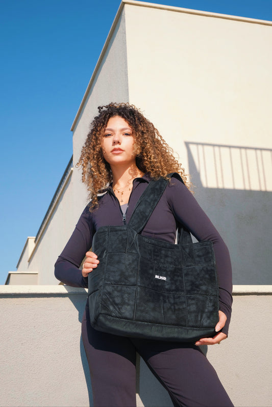 Muse puffer bag in Viper Noir