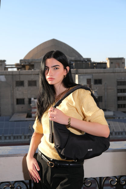 The mini croissant bag in Black